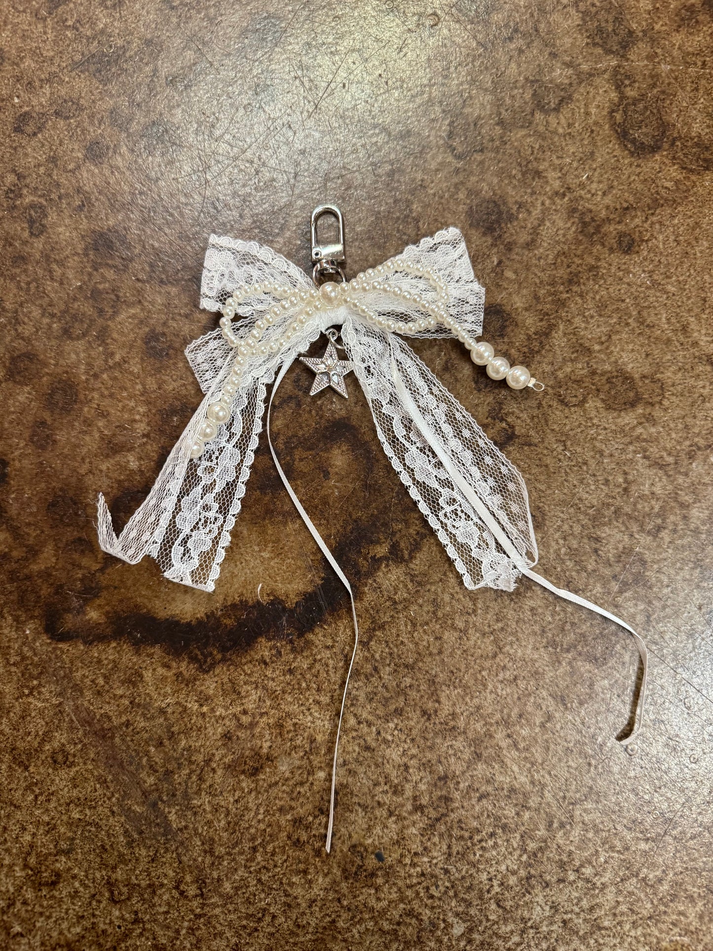 TWINKLE TIED BAG CHARM