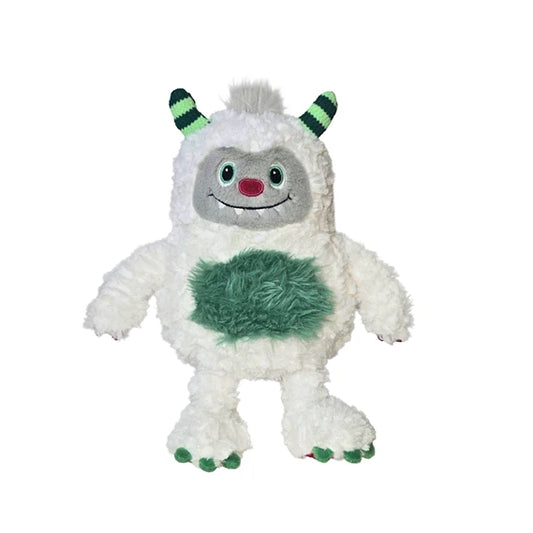 White yeti monster plush toy with green horns, belly patch, and clawed feet