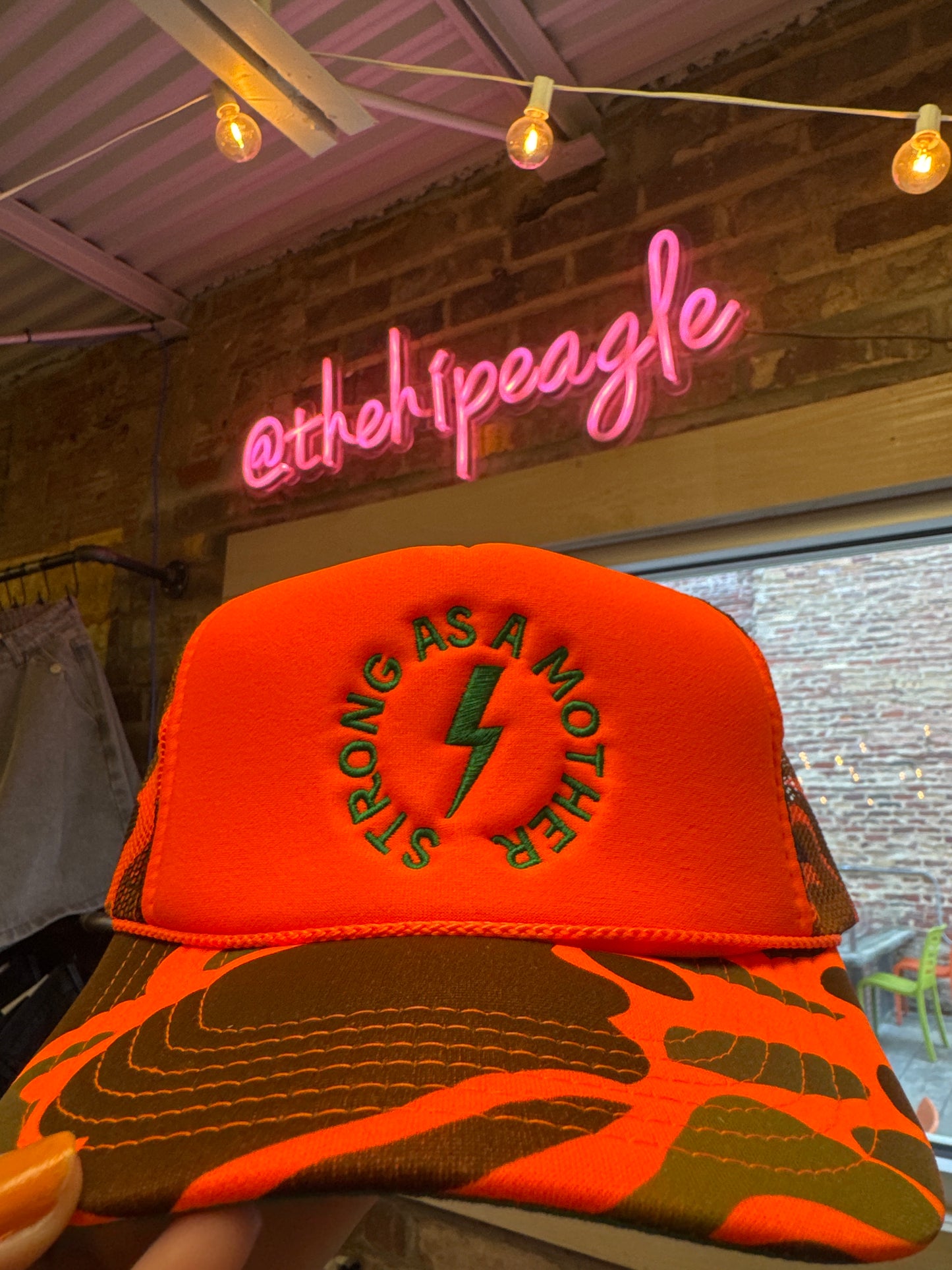STRONG AS A MOTHER TRUCKER HAT X ORANGE CAMO