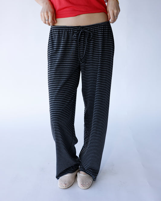 black and dark grey striped wide leg lounge pants with elastic waistband