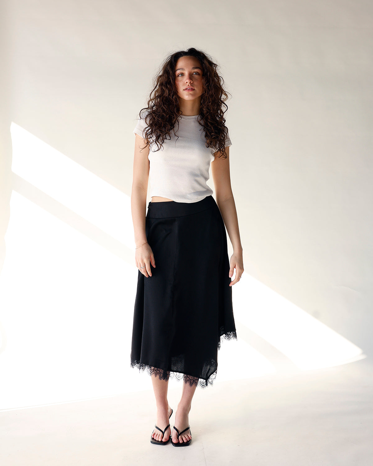 LOLA ASYMMETRIC LACE TRIM MIDI SKIRT