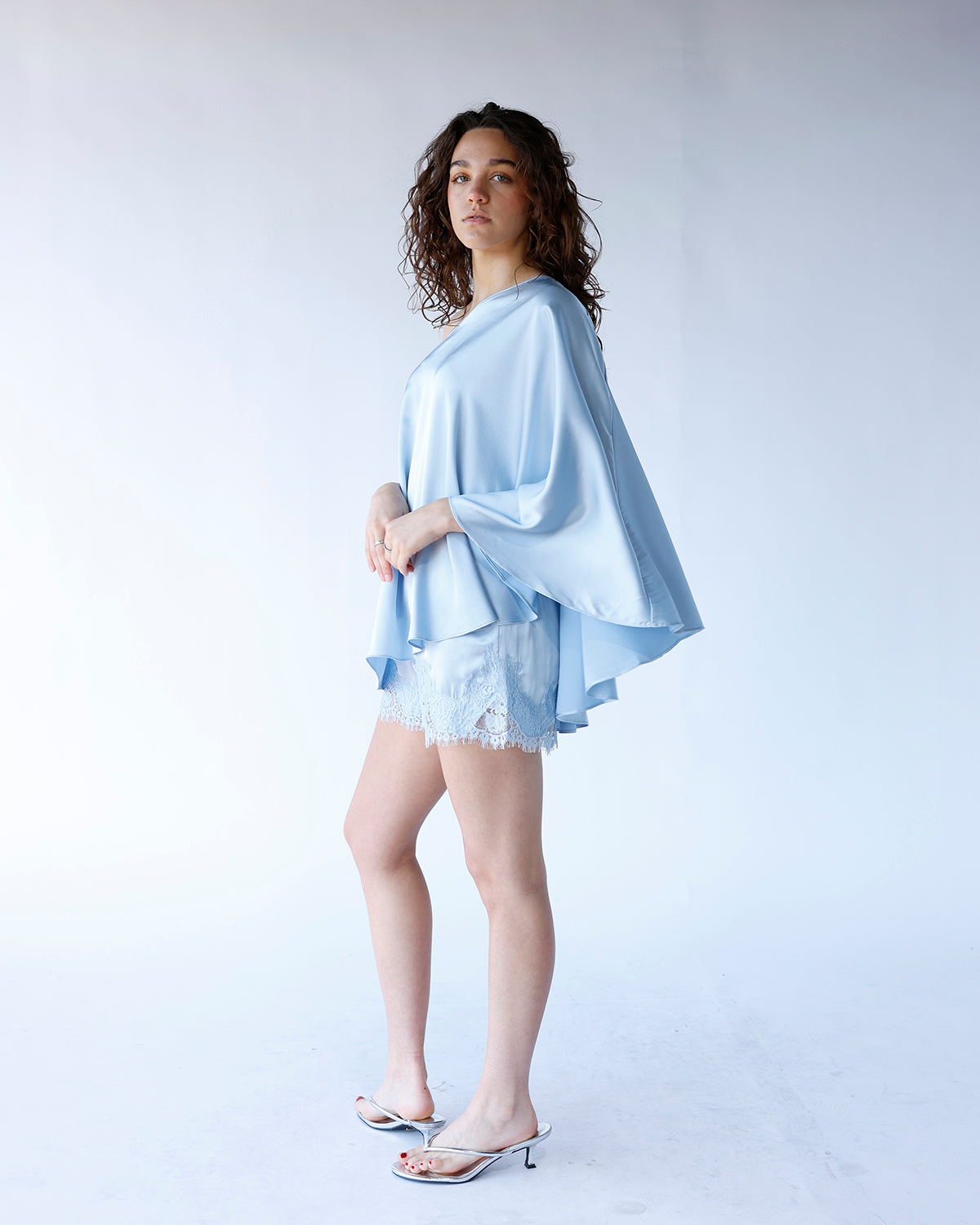 SKYLINE ONE SHOULDER PONCHO TOP