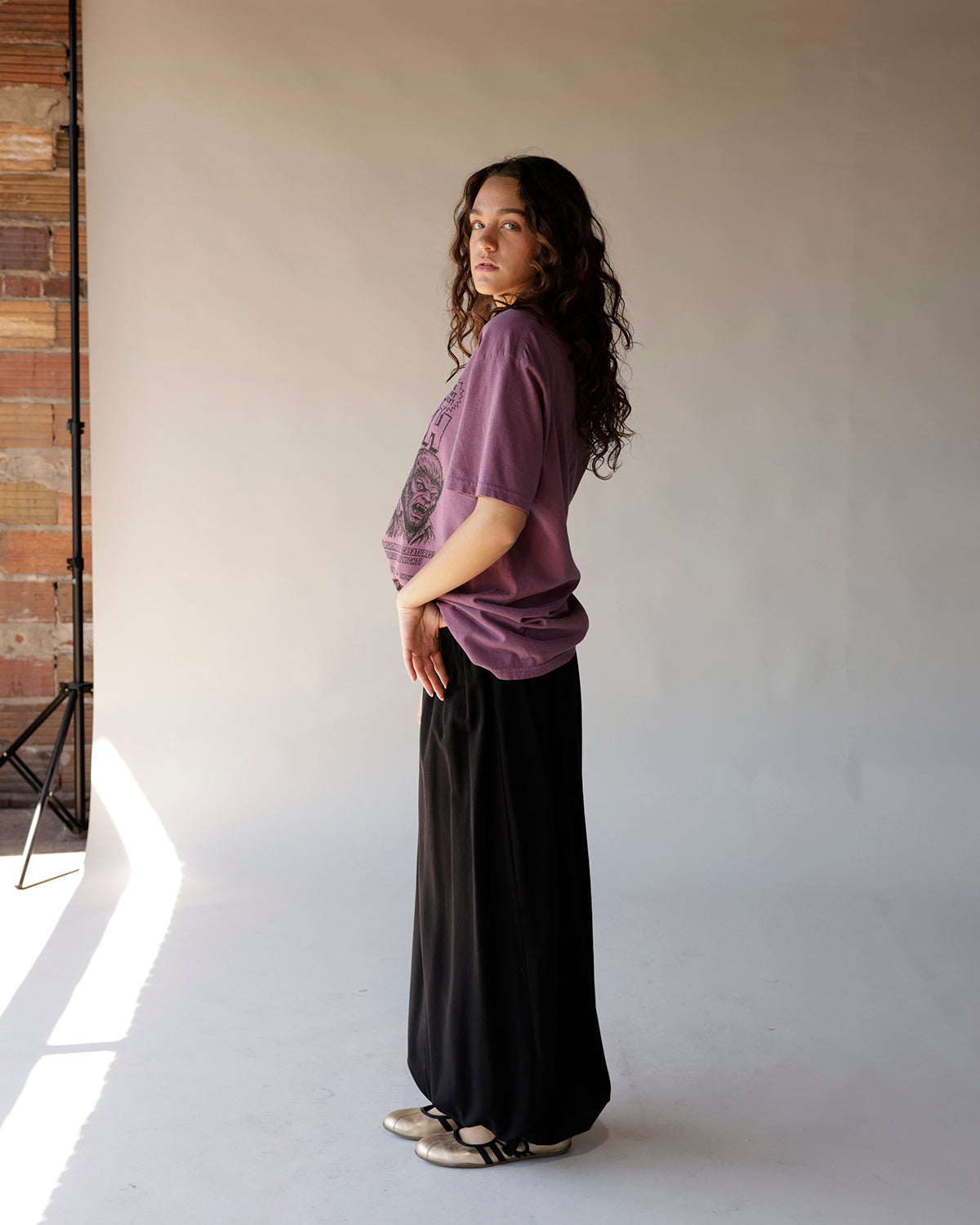 Purple oversized Monster Mash Halloween graphic tee styled with black maxi skirt