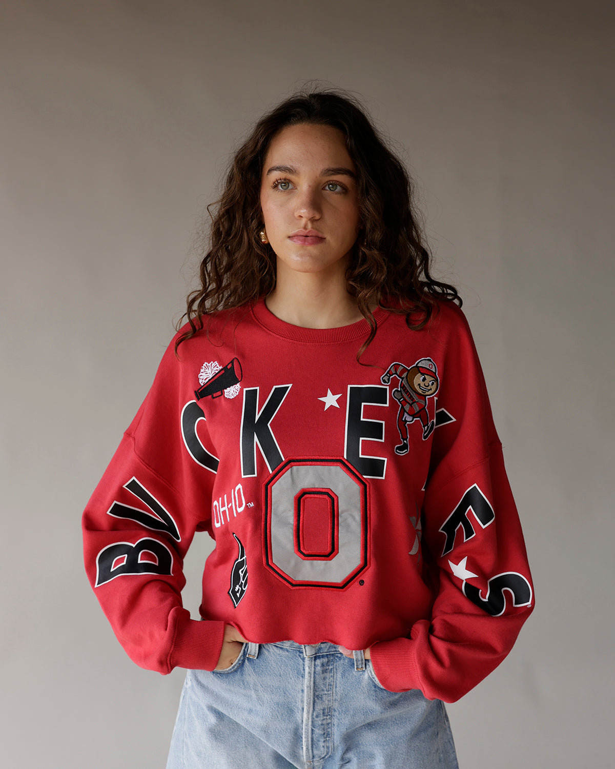 Red Ohio State Buckeyes crop sweatshirt with bold graphics and mascot print