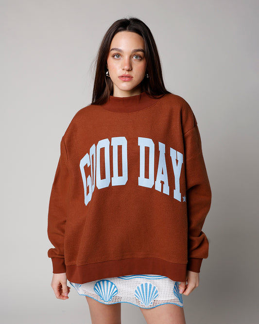 reversible graphic mock neck sweatshirt brown mock neck sweatshirt with good day graphic in blue and polka dots on reverse side