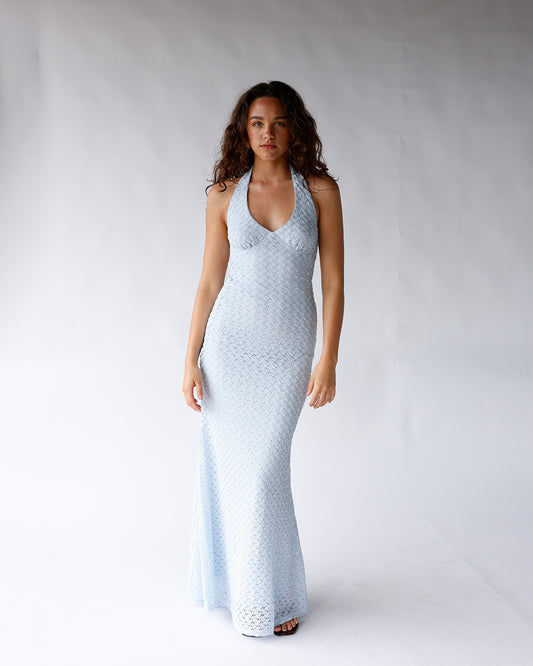 nia pluma dress light blue halter maxi dress with deep v-neckline and body skimming silhouette
