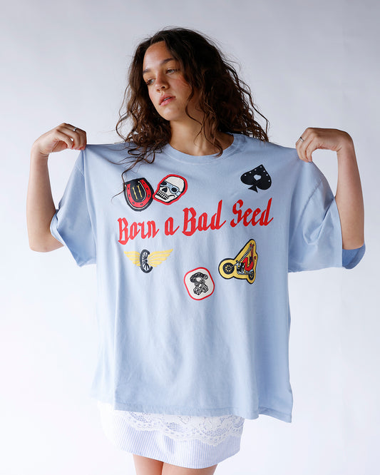 light blue graphic one size tee daydreamer born a bad seed os tee