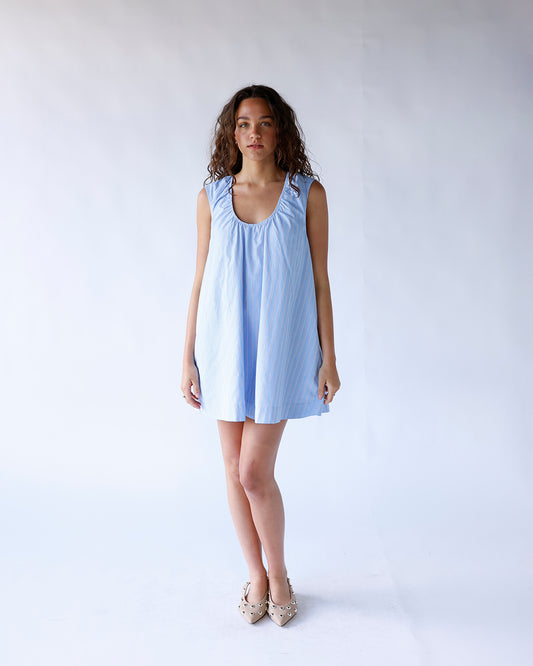 Light blue striped sleeveless mini dress with scoop neck and A-line silhouette