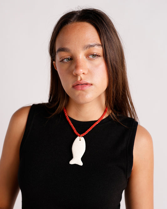 lava stone fish pendant necklace on red twisted rope cord