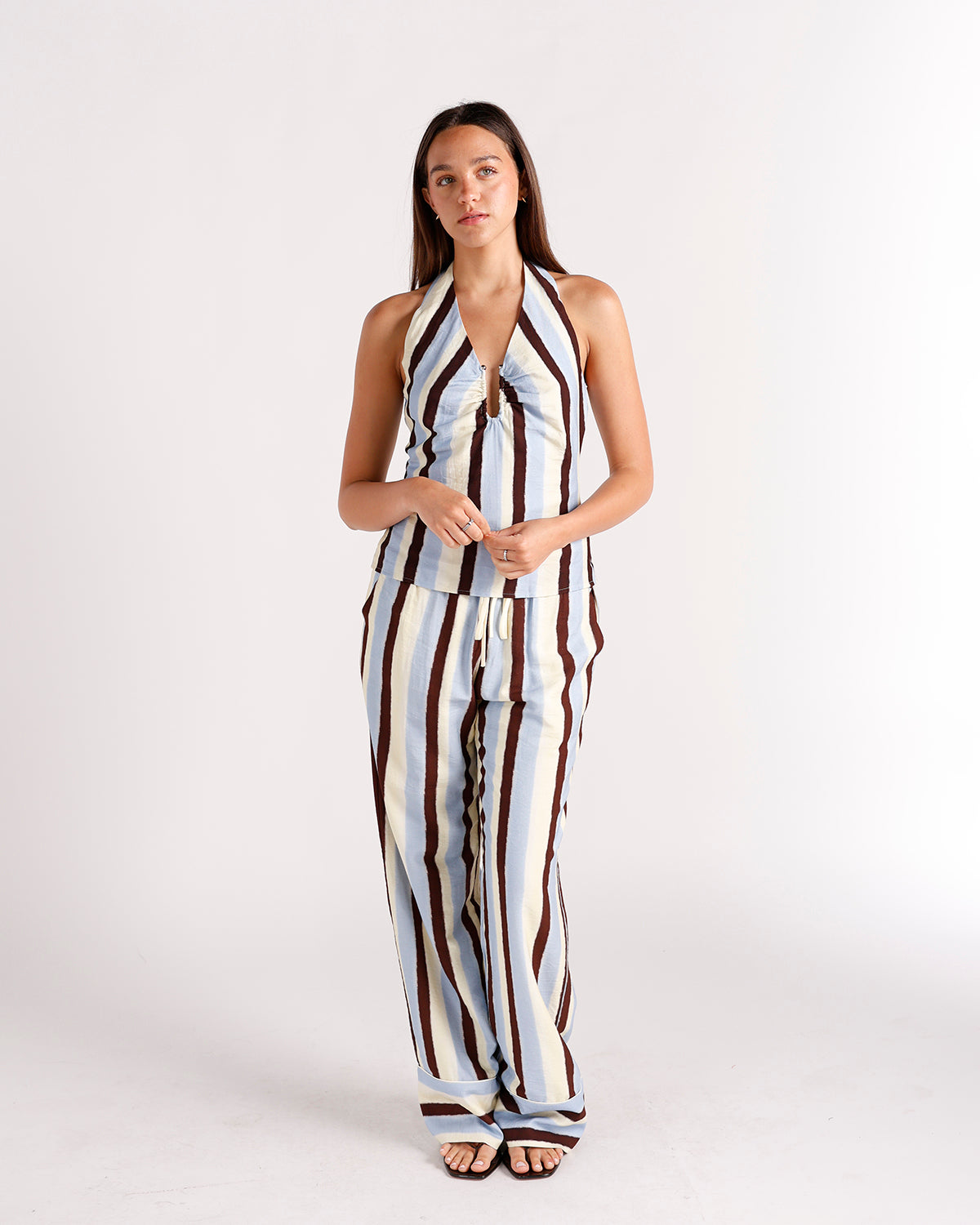 Wide-leg striped dressy pants in cream, blue, and brown with drawstring waist