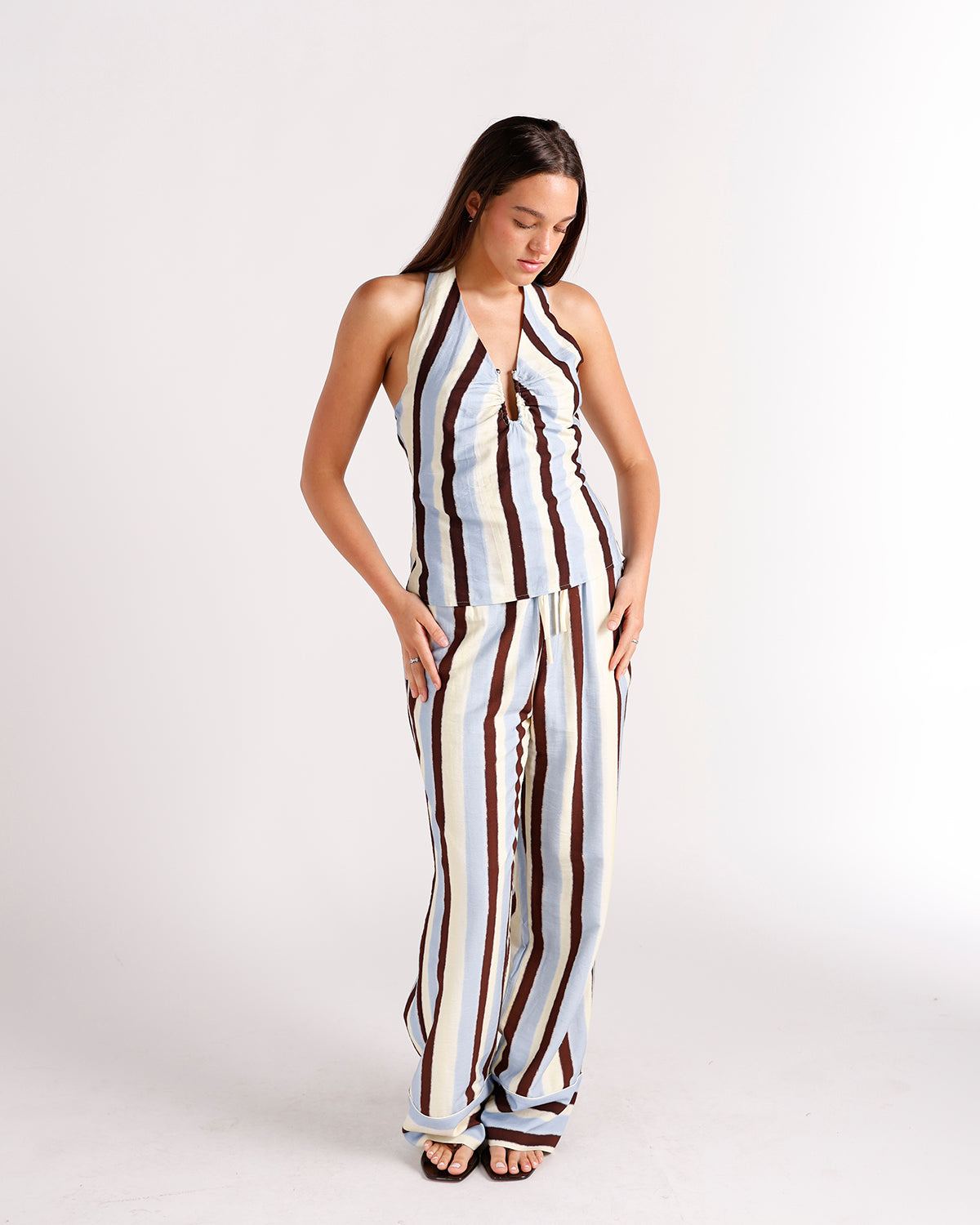 Wide-leg striped dressy pants in blue, cream, and brown vertical stripes