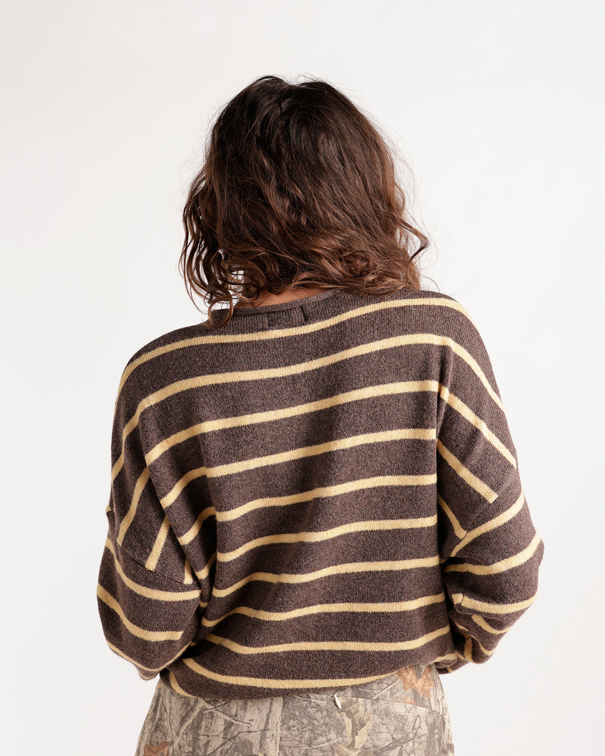Brown and mango striped knit cardigan, boxy fit, shown from the back.