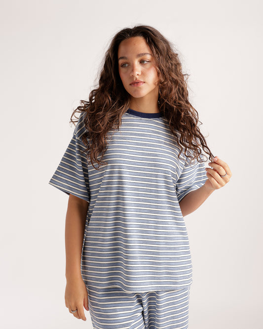 Oversized blue and white horizontal stripe short sleeve tee with navy ribbed collar