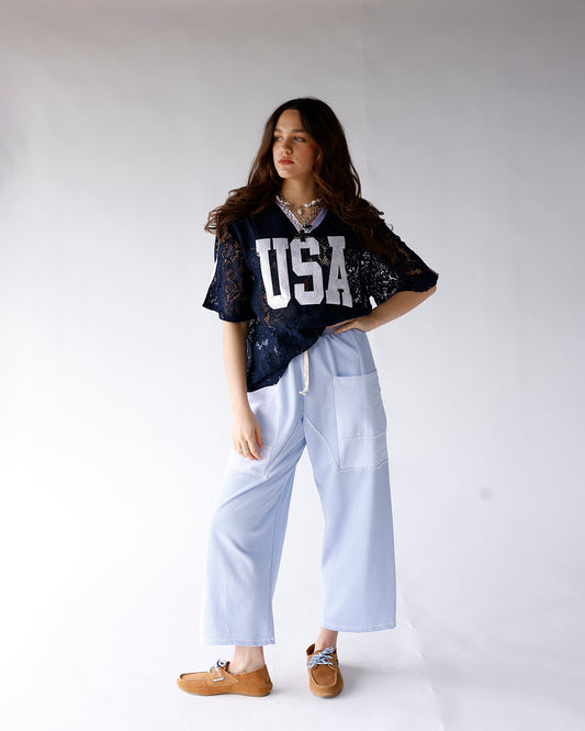 light blue mineral wash pants with striped pockets and elastic waistband comfy everyday pants women