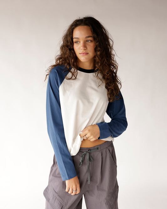Experience a modern, relaxed twist with a white and blue colorblock raglan long sleeve tee. Ideal for everyday dressing, weekend outings, and casual hangouts.