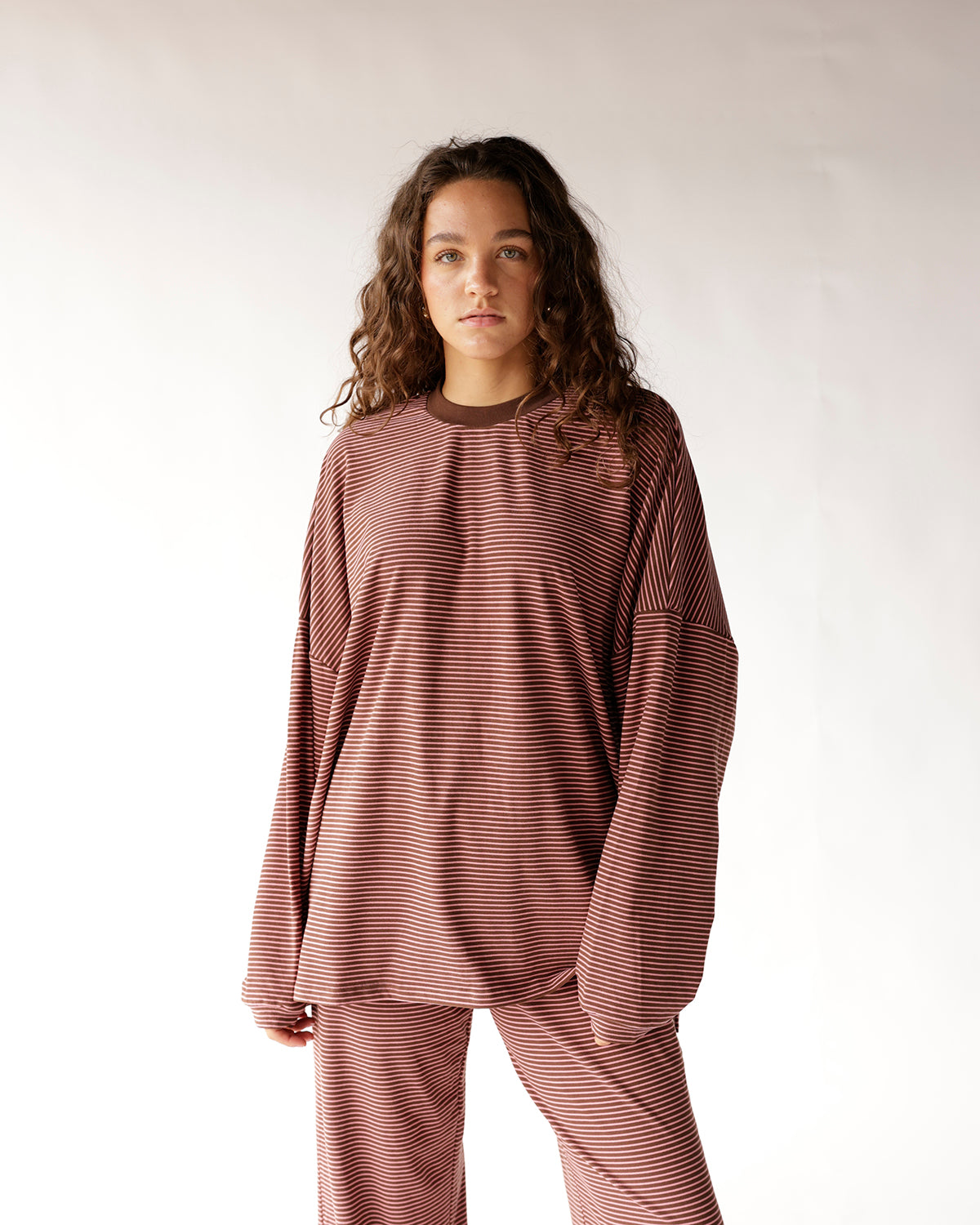Oversized brown and cream striped long sleeve top with dropped shoulders