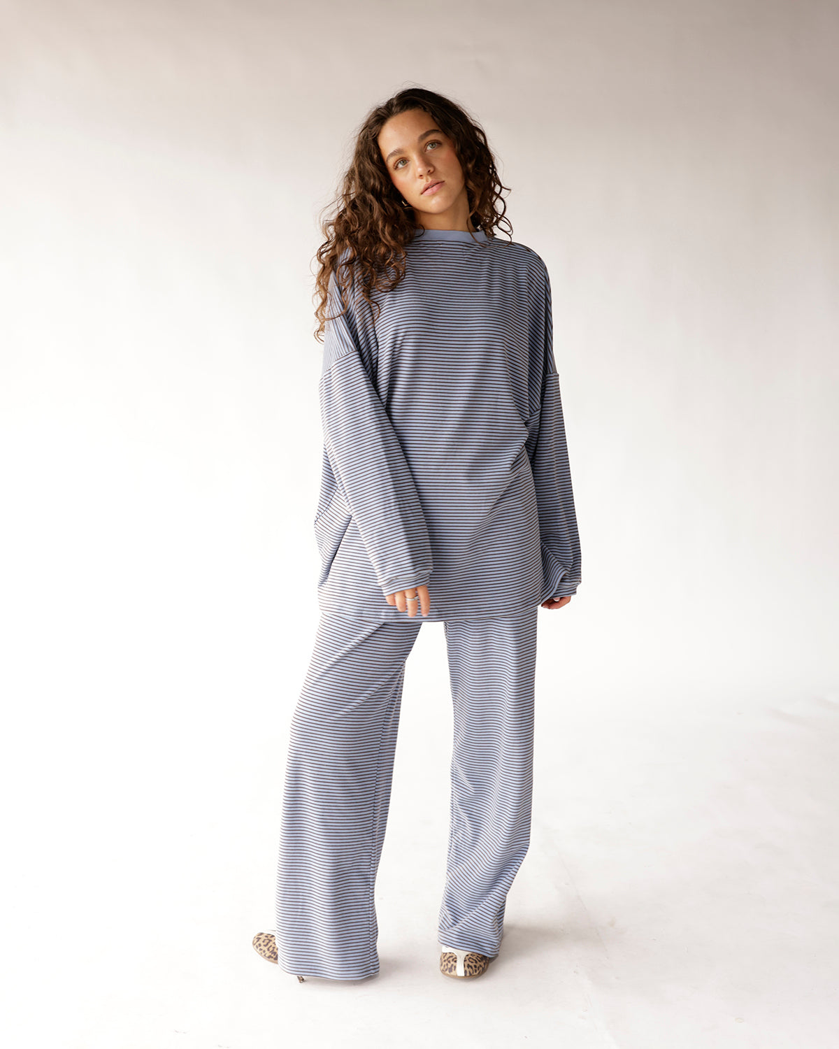 Dusty blue striped long sleeve oversized top with mock neck and wide sleeves