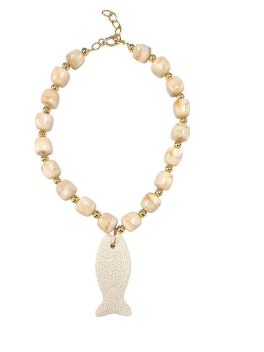 Ivory beaded necklace with gold spacers and textured lava stone fish pendant