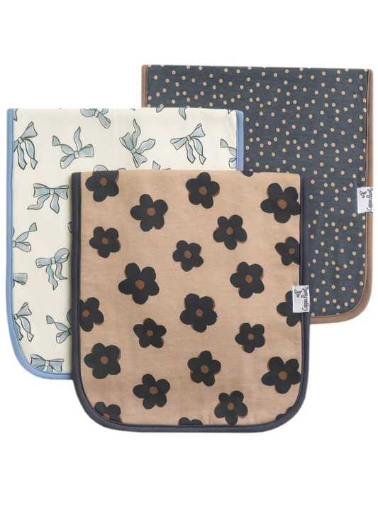 Copper Pearl Gemma burp cloth set with floral, bow, and polka dot patterns