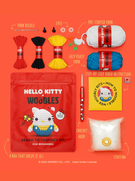 Hello Kitty crochet beginner kit with yarn, hook, needle, eyes, stuffing, and instructions