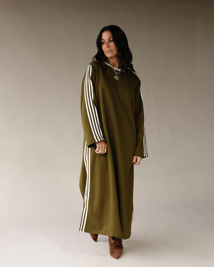 Olive green maxi dress with white varsity stripes on sleeves and sides