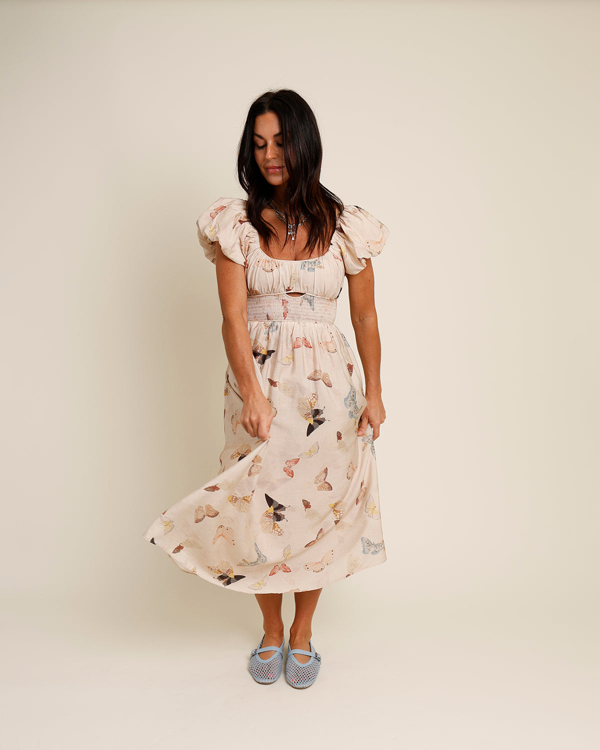tan puff sleeve butterfly print midi dress