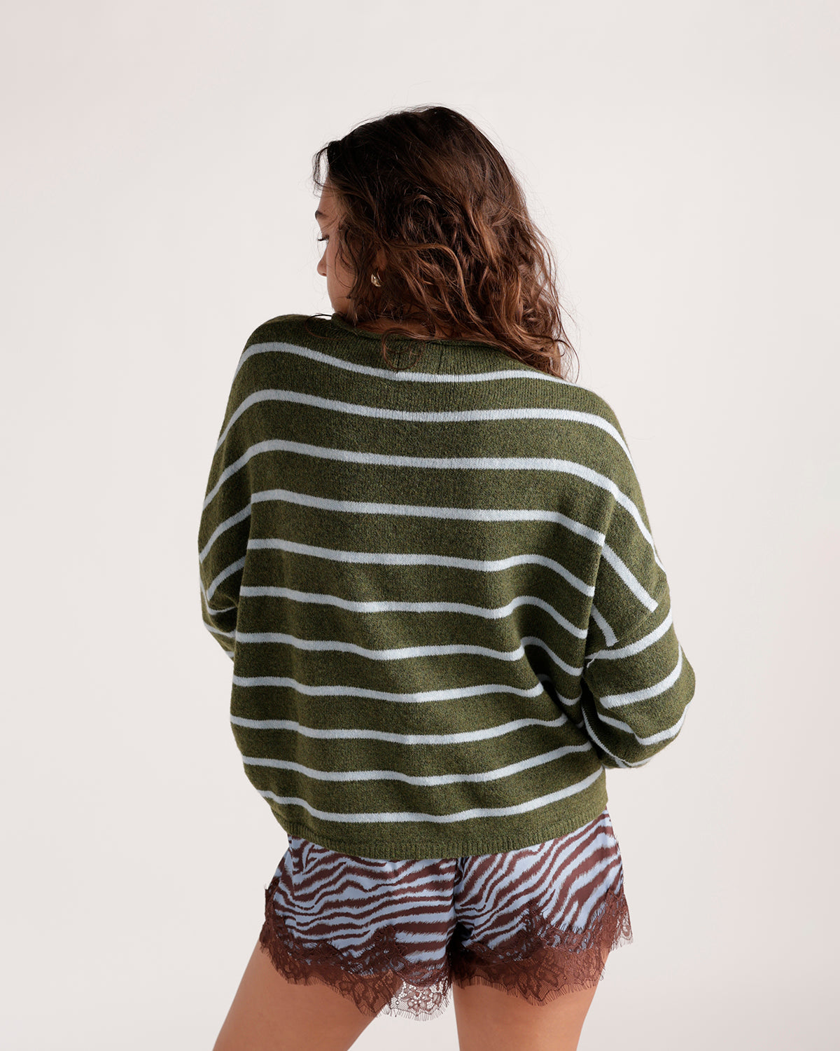 Olive green and white striped knit cardigan sweater, back view, relaxed fit