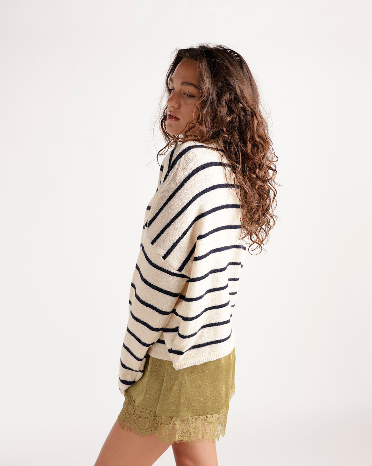 Ivory and navy striped knit cardigan with relaxed fit, side view