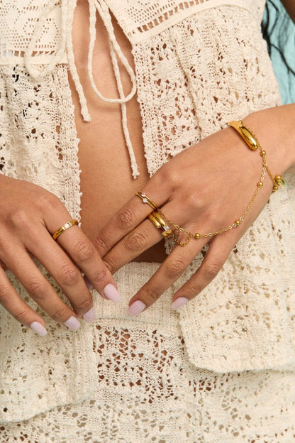 PETIT MOMENTS SOL HAND CHAIN BRACELET X GOLD