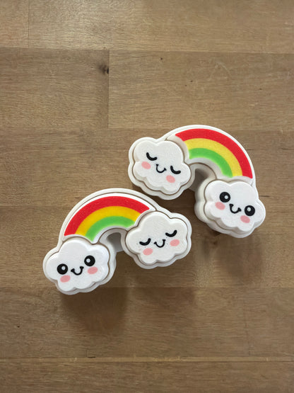 Kawaii rainbow cloud erasers with smiley faces, red yellow green stripes, white foam