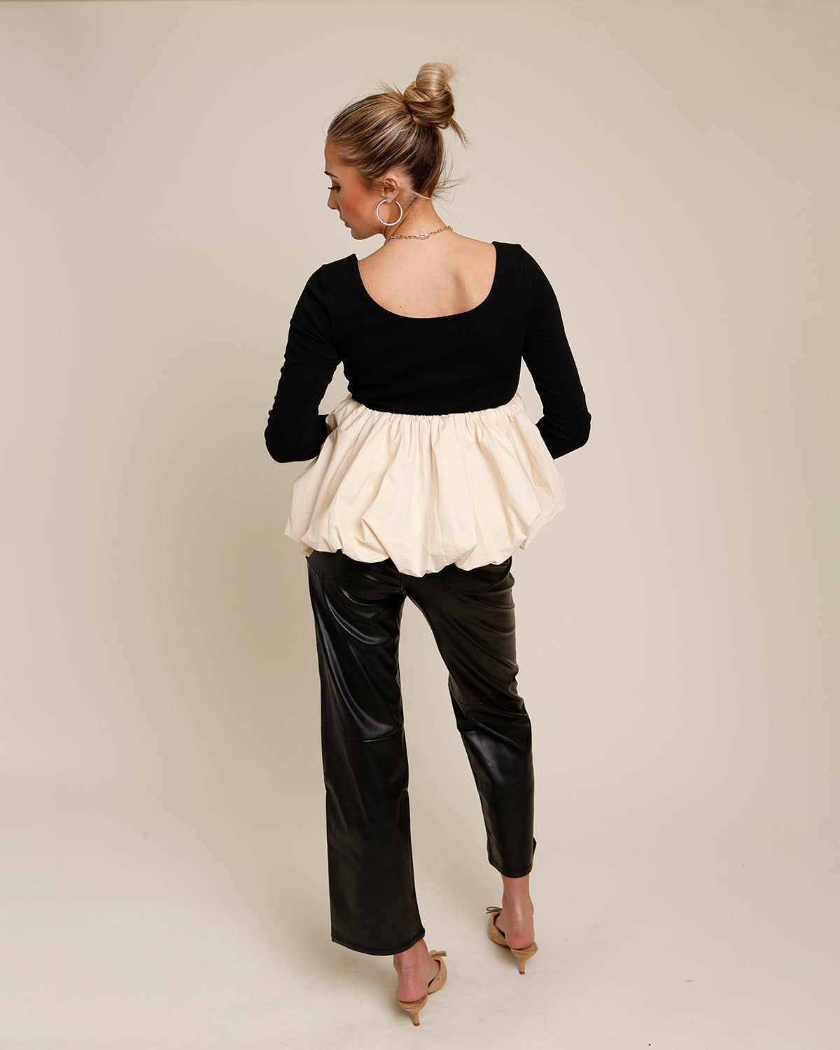 FIRST POSITION PEPLUM TOP