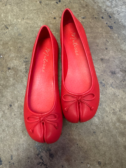 Red split-toe ballet flats with small bow detail on rounded toe cap