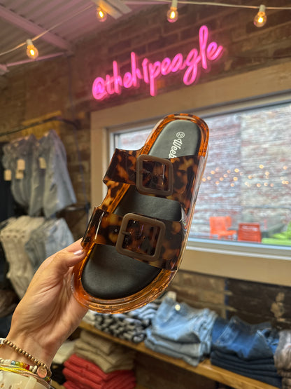 Tortoise print double strap jelly slide sandal with square buckles and black footbed