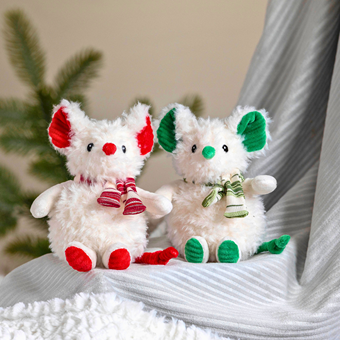 Two white plush mice with red and green holiday accents, sitting together
