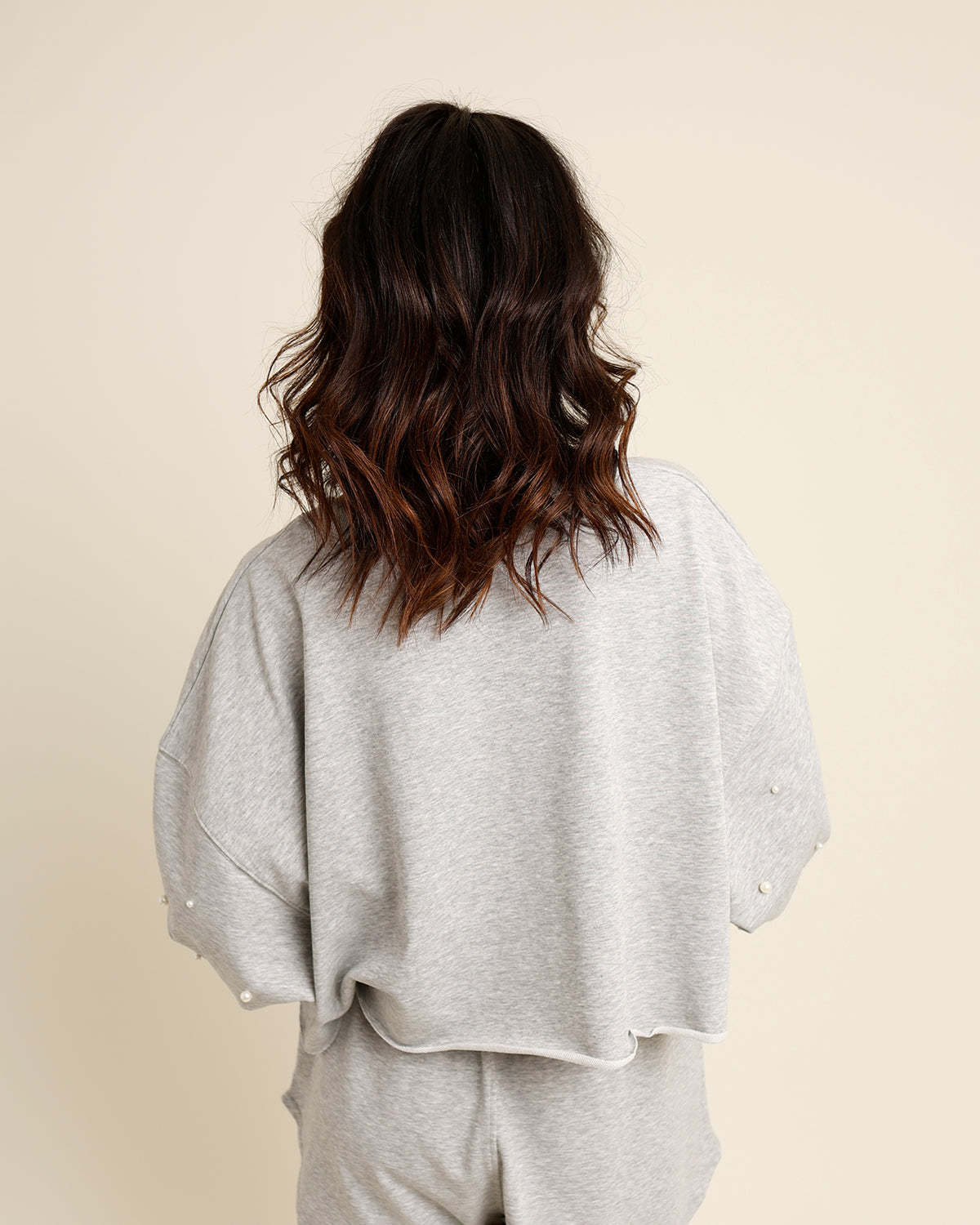 THE WORLD IS YOUR OYSTER PEARL EMBELLISHED RAW HEM TOP
