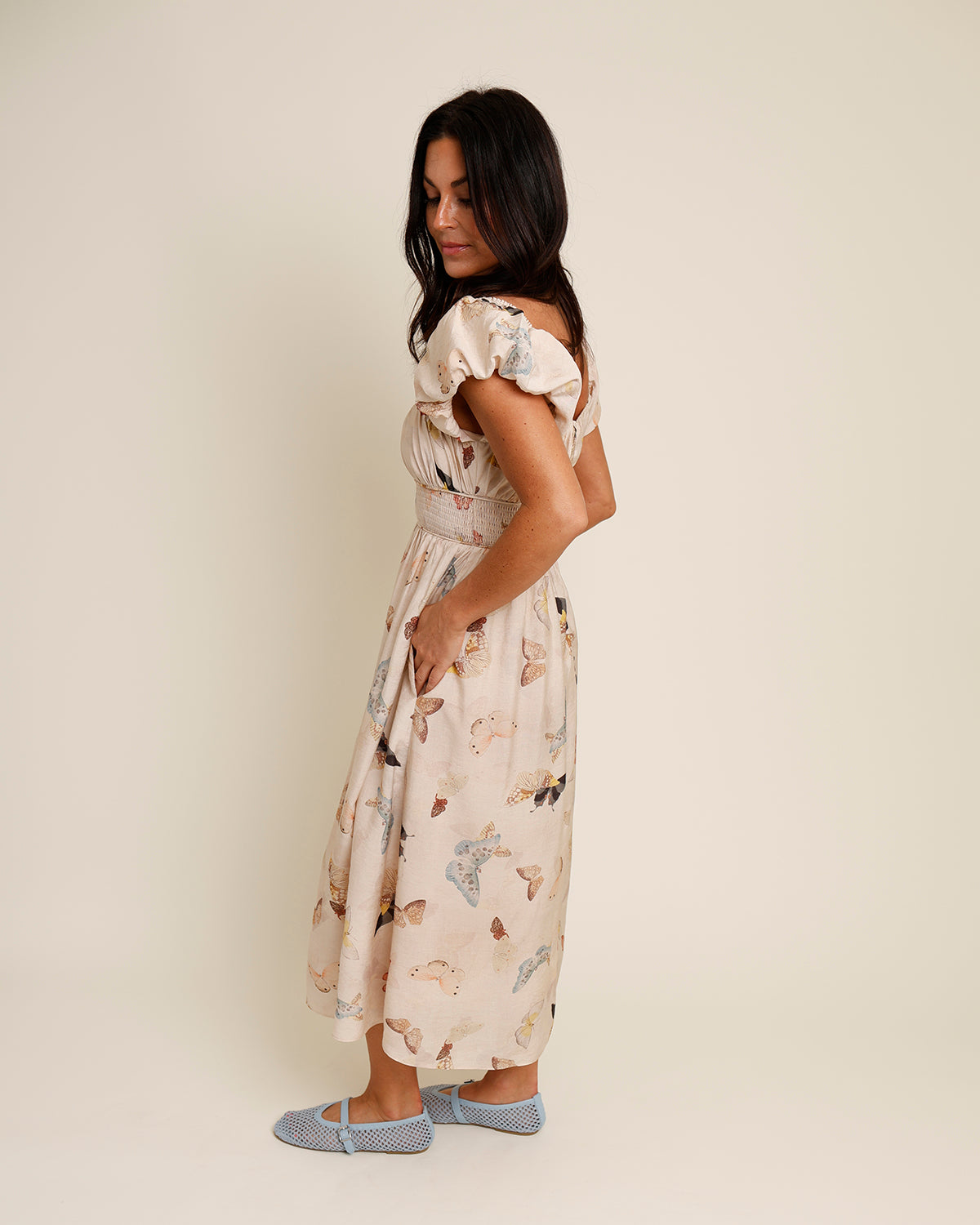 tan puff sleeve butterfly print midi dress