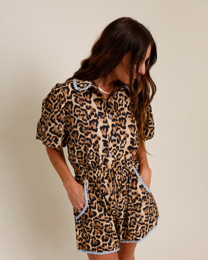 leopard print romper with blue lace trim and pockets