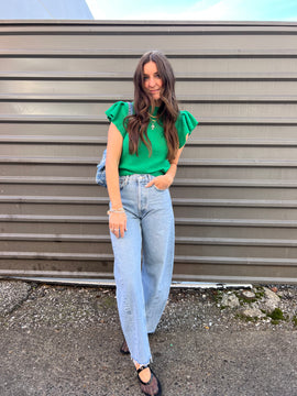 AGOLDE Luna high rise wide leg light wash blue denim jeans with raw hem