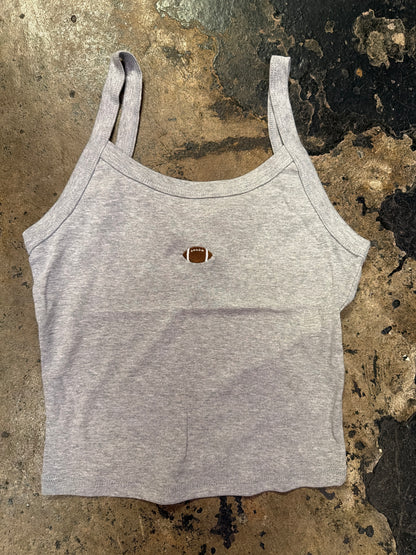 Gray cropped tank top with small embroidered football graphic at center chest