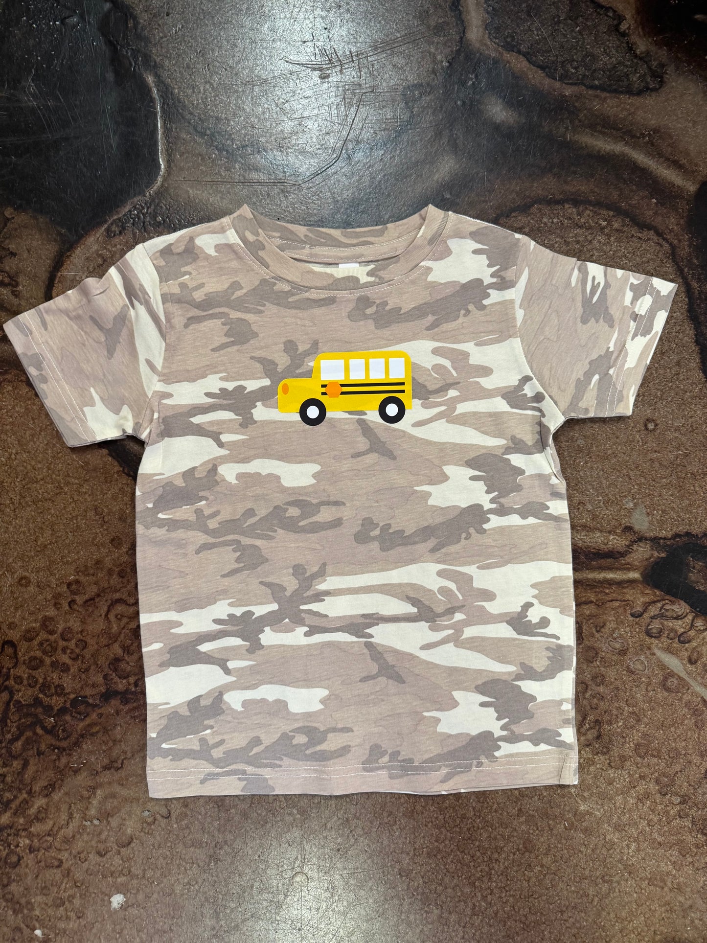 Kids tan camo t-shirt with yellow school bus graphic on chest