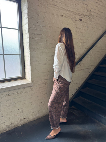 HIP LEANING INTO LEOPARD BARREL JOGGER