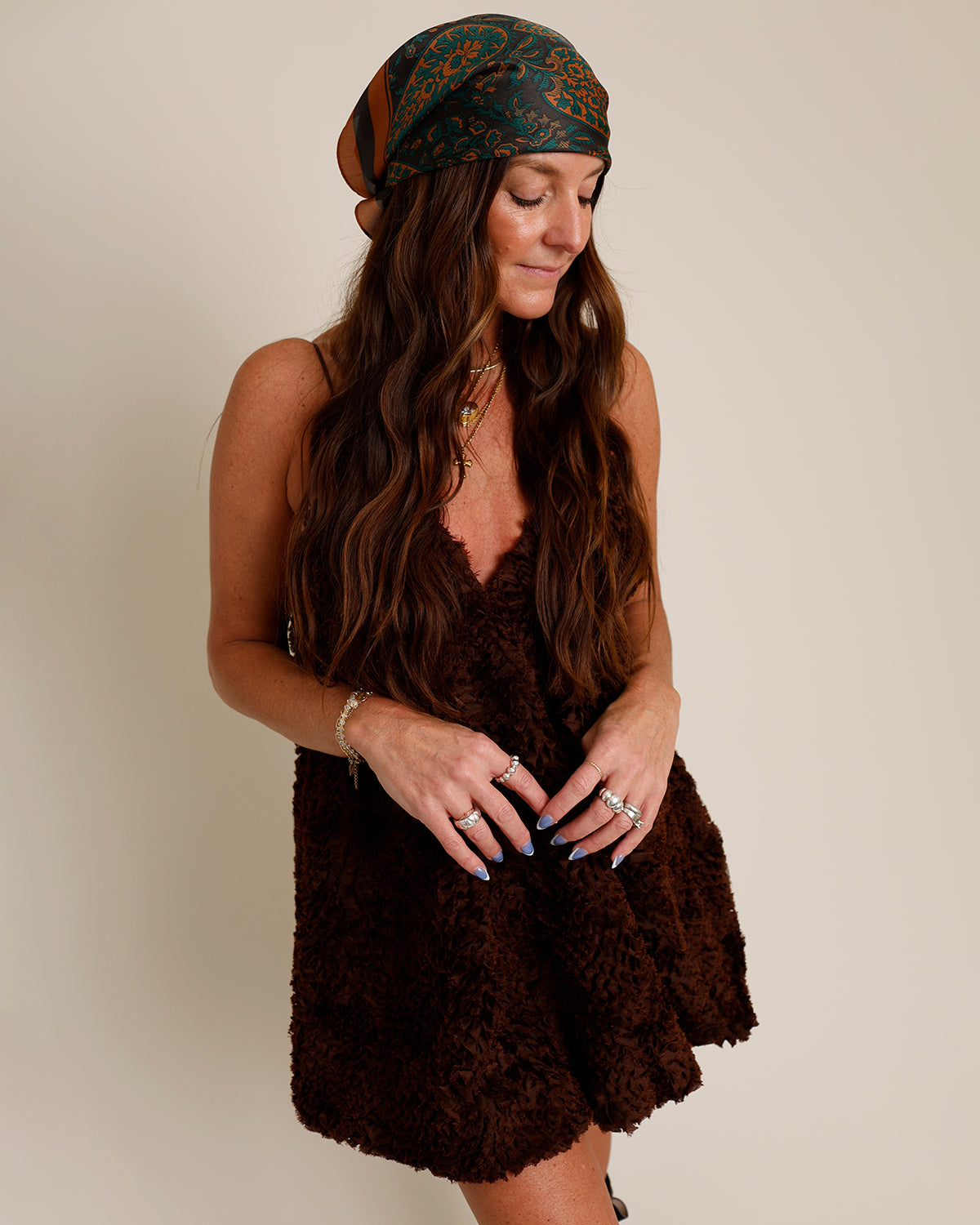 LOUELLA TEXTURED V-NECK BUBBLE HEM MINI DRESS