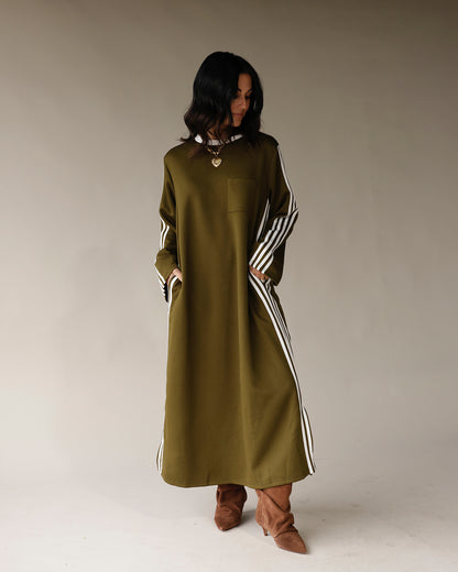 Olive green maxi track dress with white varsity stripes and long sleeves