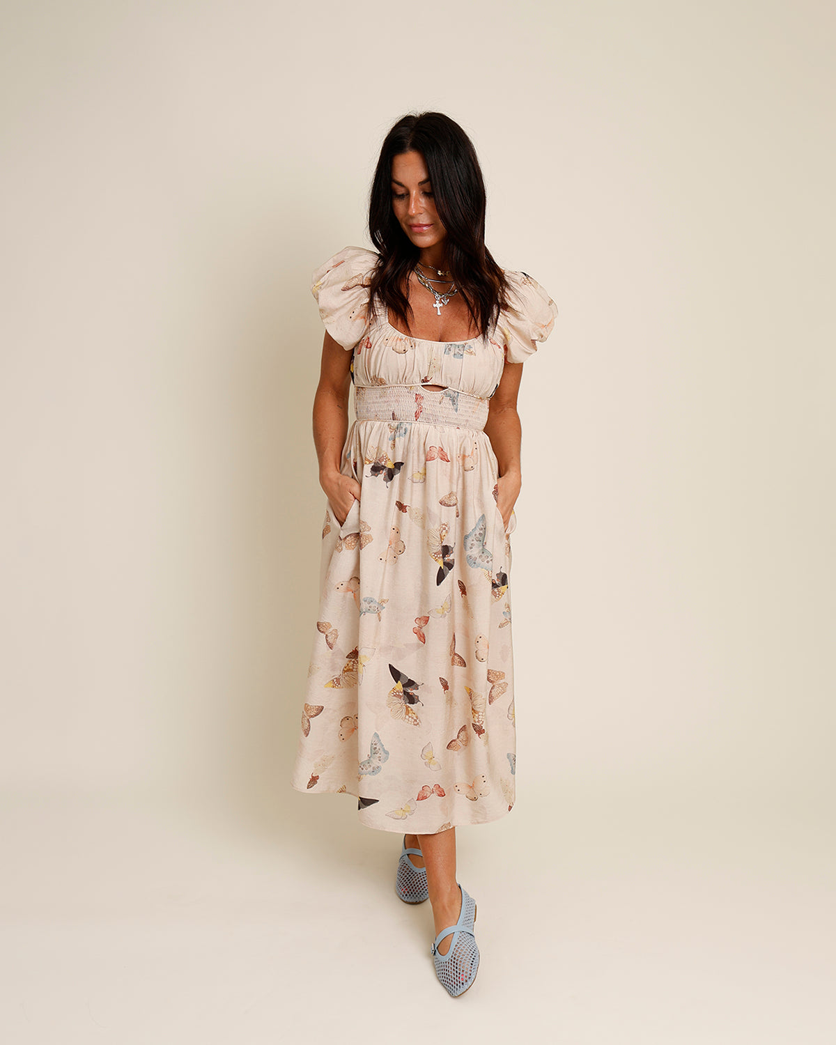 tan puff sleeve butterfly print midi dress