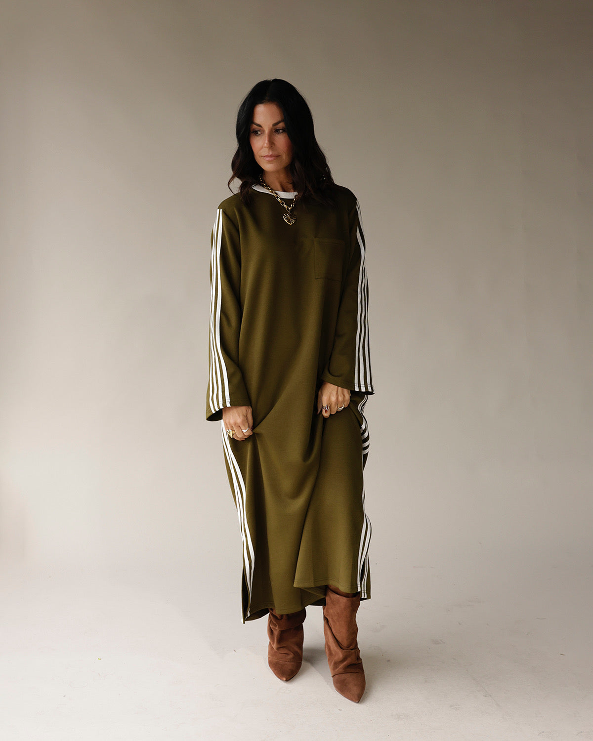 Olive green long sleeve maxi dress with white varsity side stripes