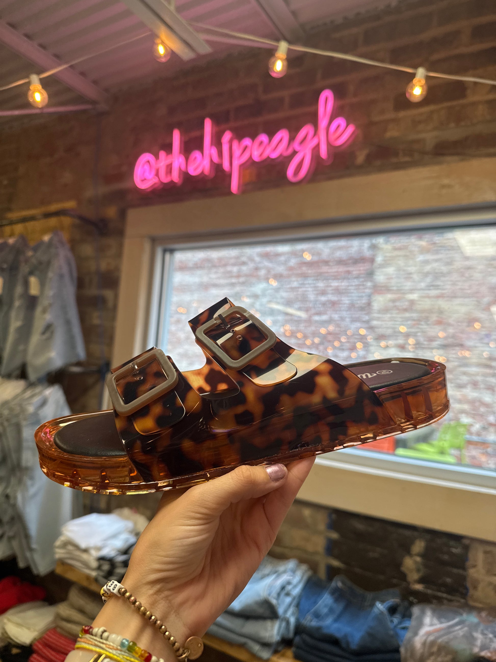 Tortoiseshell double strap jelly platform slide sandal with buckle details