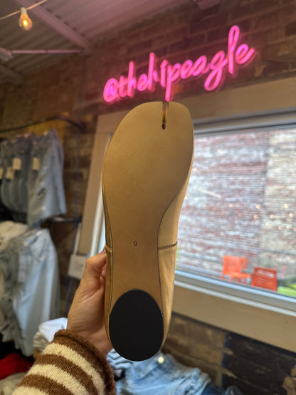 Gold ballet flat sole view, size 9, with black heel cap