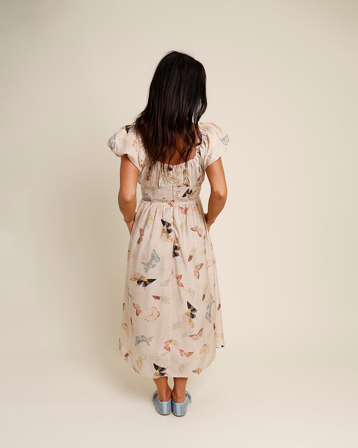 tan puff sleeve butterfly print midi dress