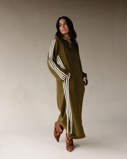 Olive green long sleeve maxi track dress with white side stripes and pockets
