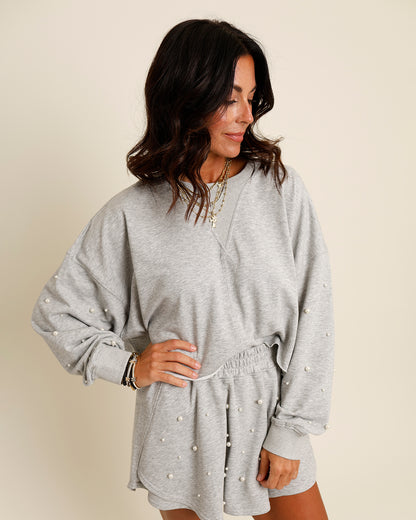 THE WORLD IS YOUR OYSTER PEARL EMBELLISHED RAW HEM TOP